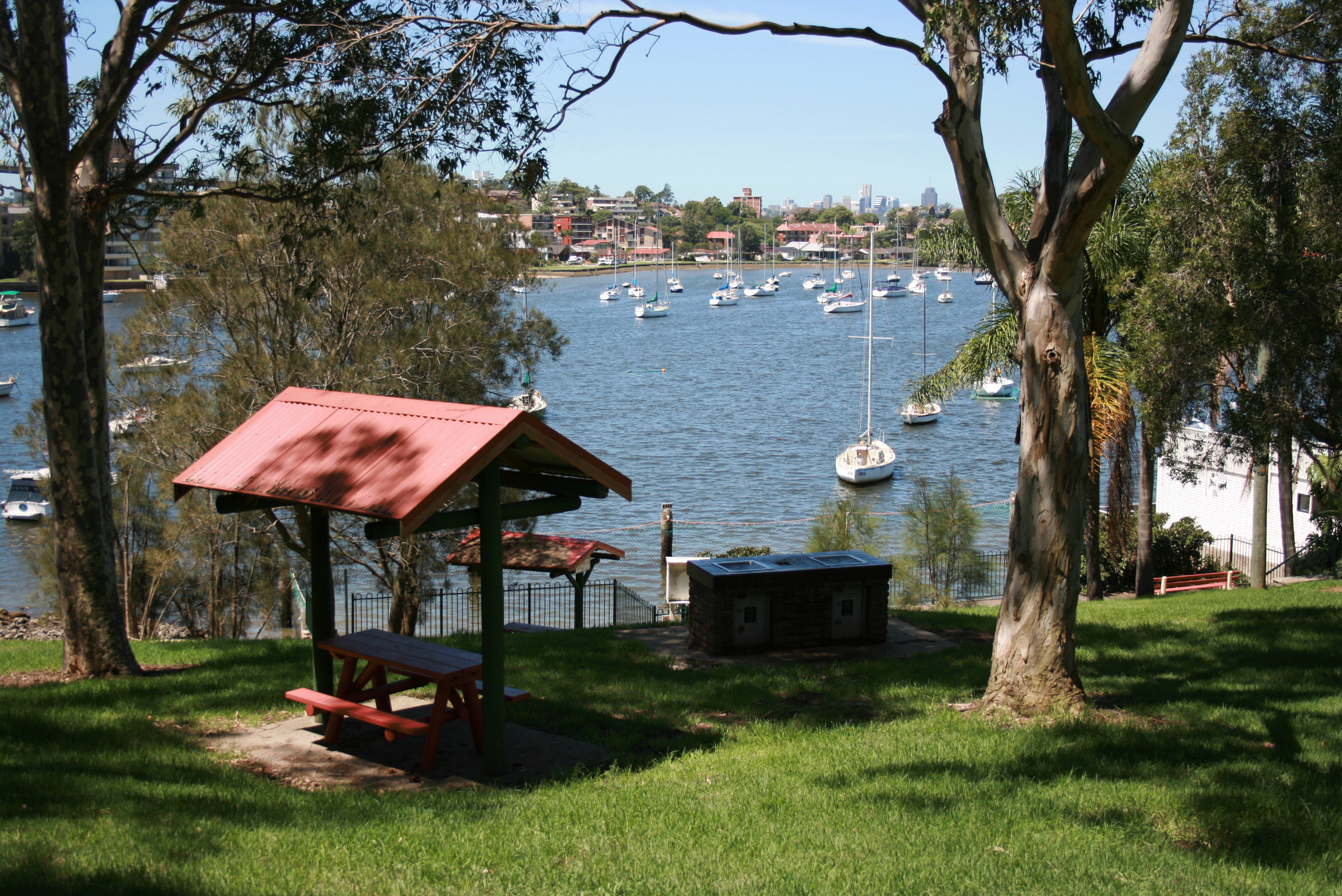 Image of picnic table in front of water