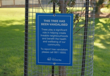 Tree vandalism sign on newly vandalised sign