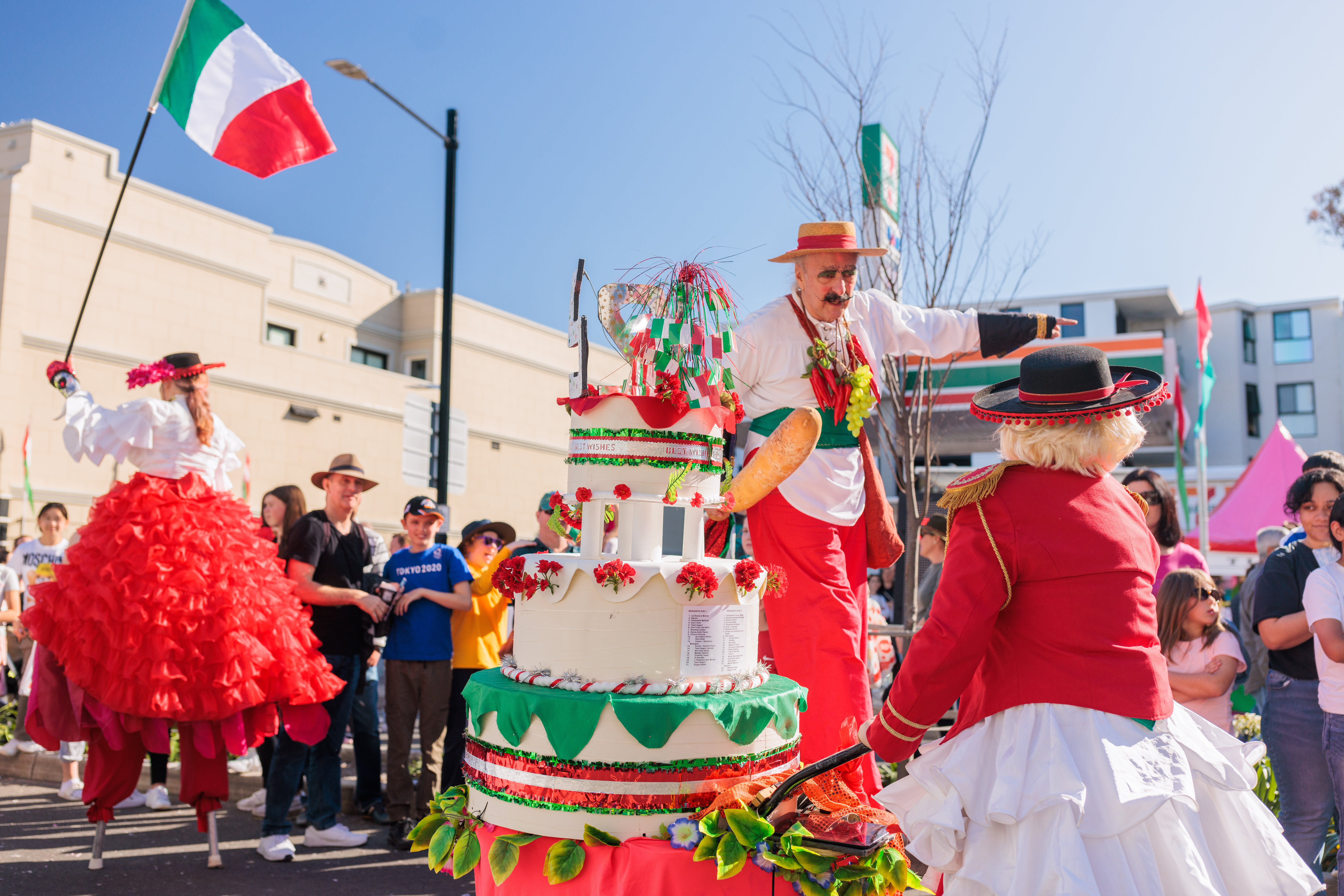 roving performers with ferra cake