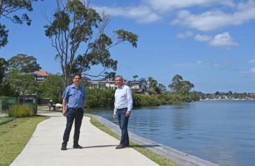 Image of resident with Mayor Angelo Tsirekas in front of water at Hen and Chicken Bay