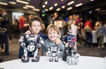 Two boys and their robots at a past Robot Ball event