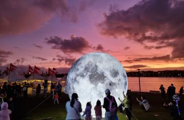 Illuminated moon installation at Rhodes Foreshore Park