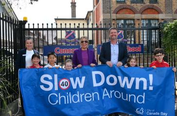 Road safety banners being hung at Concord Public School 