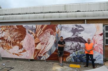 Mayor Michael Megna with renowned muralist Fintan Magee