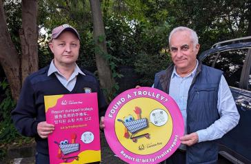 Mayor an LEO with trolley stickers