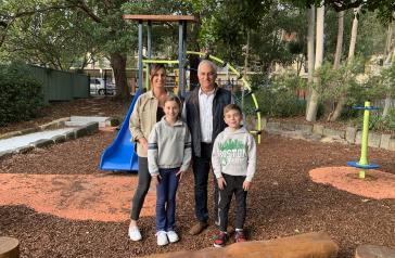 Mayor Michael Megna with local family at WA McInnes Reserve in North Strathfield